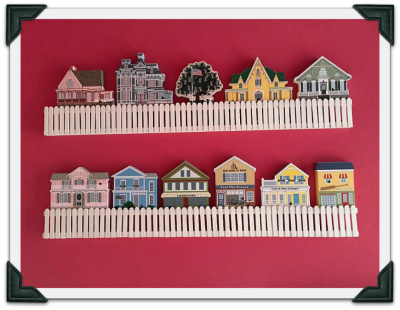 Handmade picket fence shelf Bernice created for her Cat's Meow collection.