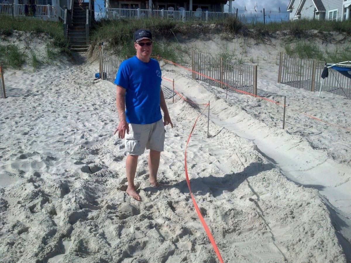 Volunteers help build ramps from sea turtle nests to the ocean so the babies have a better chance at making it to the ocean.