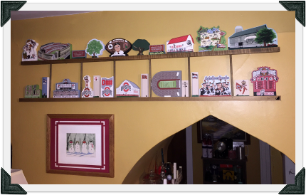 Tony's Ohio State Cat's Meow Collection displayed on Cat's Meow ladders in his home.