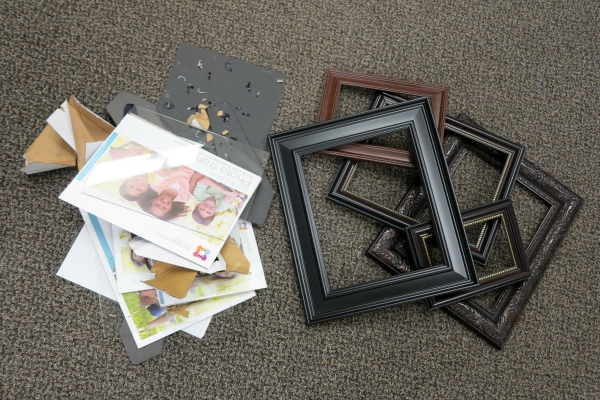Disassemble the frames leaving only the frame part to hang on the wall.