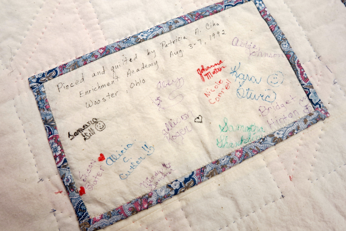 Signature panel of a Shoo Fly Quilt block. Signed by all the students in Chris's mother's quilting class.