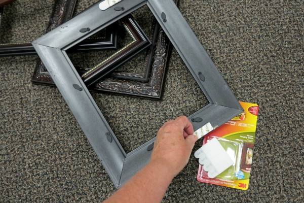 Apply Command Hanging Strips to the back of the frames