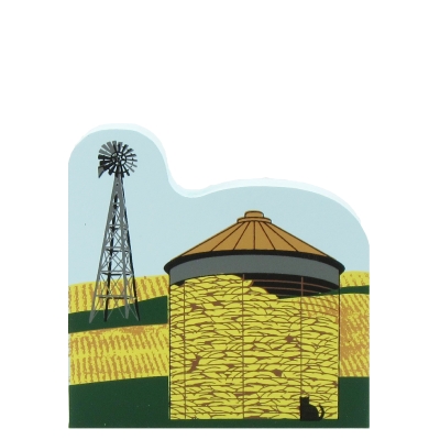 Corn crib with Amish windmill in the background. Wayne and Holmes Counties, Ohio