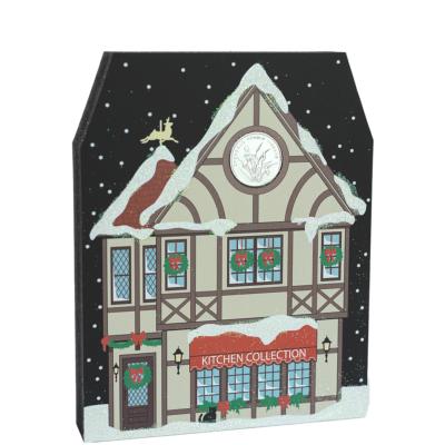 Your holiday decor won't be complete without this glittery North Pole Kitchen Collection shop. Handcrafted by The Cat's Meow Village in the USA.