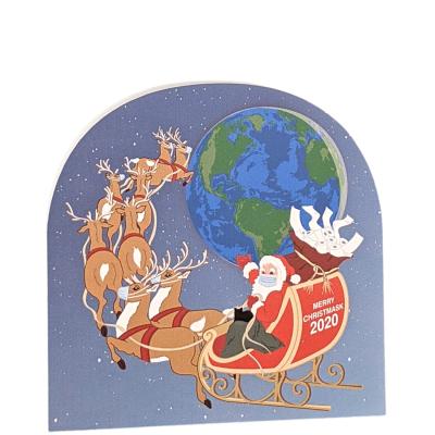 Santa's flight in 2020 might look different due to Covid, the pandemic and quarantine. Handcrafted in 3/4" thick wood by The Cat's Meow Village is the USA.