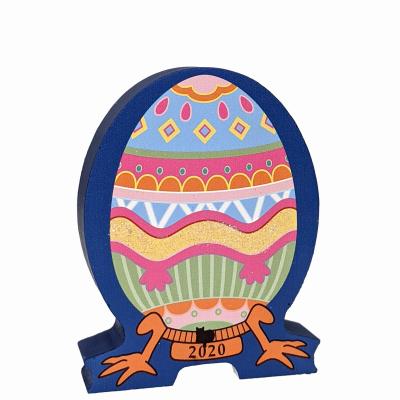 This beautifully colored keepsake, Furbergé Egg Pink Paws 2020 is handcrafted in ¾” thick wood for you by The Cat’s Meow Village.