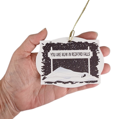 You are now in Bedford Falls ornament handcrafted in 1/4" thick wood by The Cat's Meow Village in the USA.