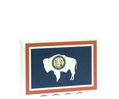 Slightly larger than a deck of cards, this wooden postcard version of the Wyoming flag can fit into any nook around your home or workplace showing off your state pride! Handcrafted in the USA by The Cat's Meow Village.