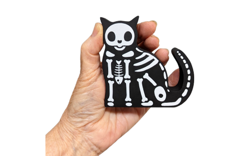 Casper our mascot really does have a backbone! He's all ready to go for Halloween with his skeleton attire!. Handcrafted in Wooster, Ohio by The Cat's Meow Village.