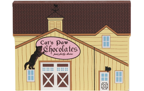 Handcrafted wooden shelf sitter of the Chocolate Barn created by The Cat’s Meow Village