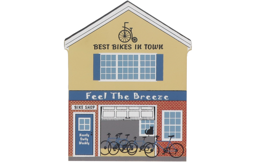 Decorate your home with a little wooden Village that reminds you of Feel the Breeze Bike Shop. Handcrafted in wood by The Cat's Meow Village.