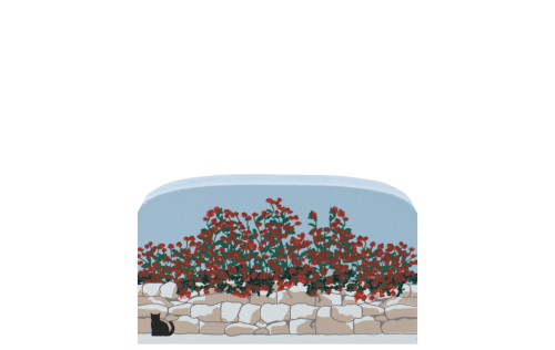 Roses cascading over a stone wall handcrafted in 3/4" thick wood by The Cat's Meow Village in the USA.