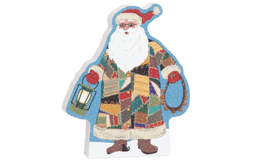 Handcrafted Quilted Santa ready to add to your holiday decor. Crafted in 3/4" thick wood by The Cat's Meow Village