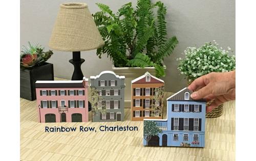 Just a few of the Rainbow Row house replicas lining Bay Street in Charleston, SC. Now create you own miniature version of the most photographed street in American. Crafted by The Cat's Meow Village in the USA.