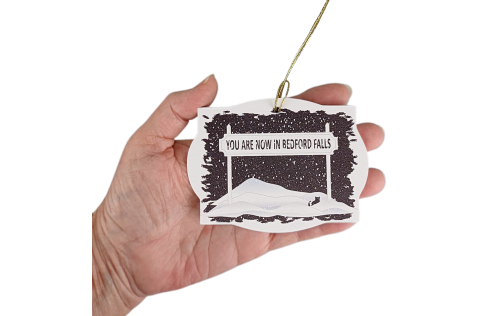 You are now in Bedford Falls ornament handcrafted in 1/4" thick wood by The Cat's Meow Village in the USA.