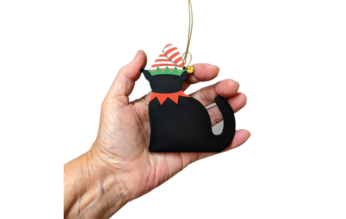 Get your paws on this Casper Elf ornament for your tree and gifts. Handcrafted by The Cat's Meow Village in the USA.