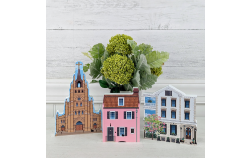 Cathedral of St. John the Baptist, the Pink House and the Patrick O'Donnell House wooden replicas look right at home.