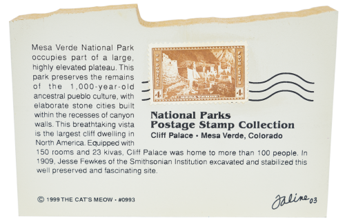 Back of wooden Cat's Meow keepsake of the Cliff Palace with vintage 4 cent U.S. Postage stamp.