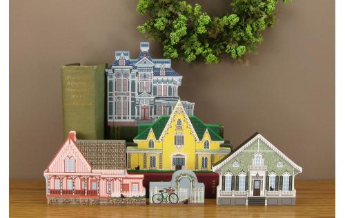 Example of the Cat's Meow Village Victorian homes grouped together on a table