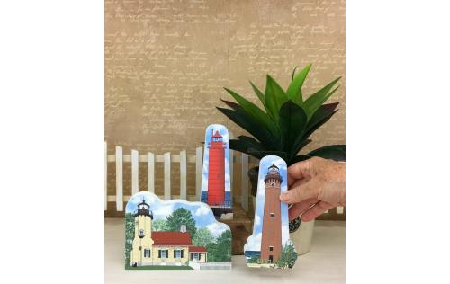 Muskegon, White River and Little Sable Point lighthouses shown together as an example of how you can display them in your home. Handcrafted in the USA by The Cat's Meow Village.