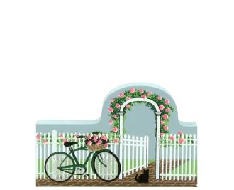Rose trellis fence with bike and open gate invites you in. Handcrafted in wood by The Cat's Meow Village