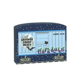 This Crooked Creek Meats train car is part of a 5-piece Halloween train set. Handcrafted by The Cat’s Meow Village in Wooster, Ohio from ¾” thick wood to set on a bookshelf, mantel, windowsill, or the trim above your doorway.