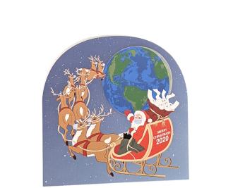 Santa's flight in 2020 might look different due to Covid, the pandemic and quarantine. Handcrafted in 3/4" thick wood by The Cat's Meow Village is the USA.