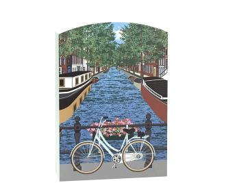 Add this scene of an Amsterdam canal to your home decor to remind you of your trip to the Netherlands. Handcrafted in the USA by The Cat's Meow Village. 