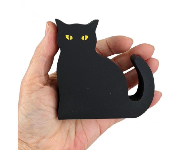 Get your paws on, Casper, our black cat mascot, with glowing eyes. Handcrafted in the USA by The Cat's Meow Village.