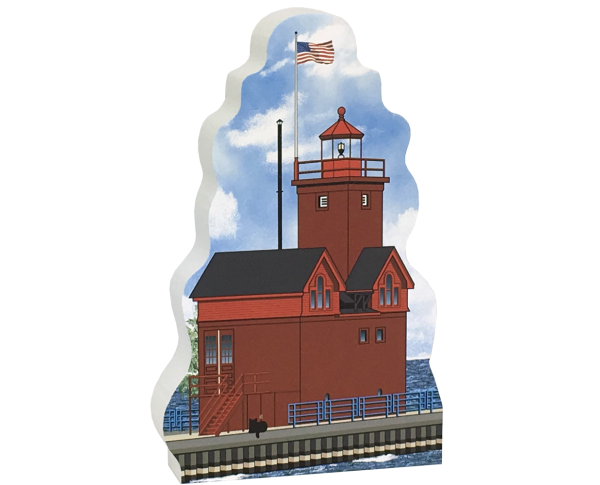 Add this wooden replica of the Big Red Lighthouse in Holland, Michigan to your home decor, handcrafted in the USA by The Cat's Meow Village