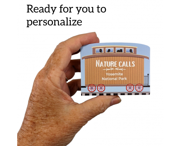 Personalize a train car with where nature keeps calling you. Handcrafted by The Cats Meow Village in 3/4" thick wood.