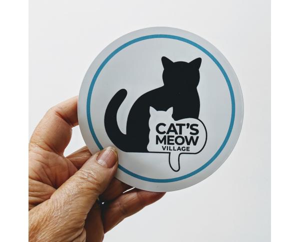 4" Vinyl sticker of Cat's Meow Village logo with teal edge