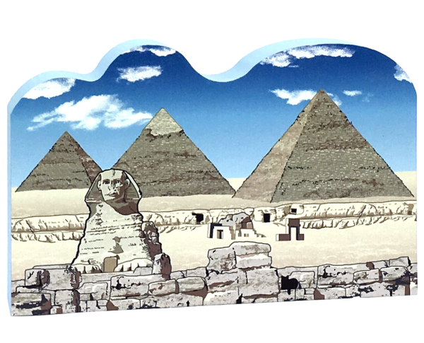 This wooden replica of the Great Pyramids in Giza, Egypt, was handcrafted by The Cat's Meow Village and made in the USA.
